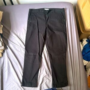 black denim trousers with slight crop